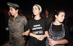 The Fattal family being forcibly evacuated from the Ulpana outpost in the West Bank settlement of Beit El (photo credit: Miriam Alster/Flash90)