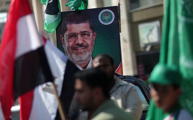 Palestinians in Gaza celebrate the victory of Mohammed Morsi in Egypt, June 18 (photo credit: Wissam Nassar/Flash90)