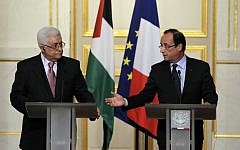 French President Francois Hollande, right, and Palestinian President Mahmoud Abbas in Paris in 2012 (photo credit: AP/Francois Mori)