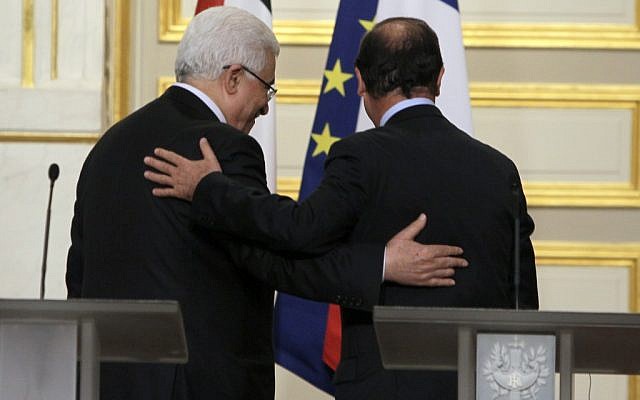 French President Francois Hollande, right, and Palestinian President Mahmoud Abbas leave after a press conference following their meeting at the Elysee Palace in Paris in June, 2012. (photo credit: AP/Francois Mori) French President Francois Hollande, right, and Palestinian President Mahmoud Abbas leave after a press conference following their meeting at the Elysee Palace in Paris in June, 2012. (photo credit: AP/Francois Mori)