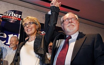 Gabriella Giffords and her replacement Ron Barber in June. (photo credit: AP/Ross D. Franklin, pool)