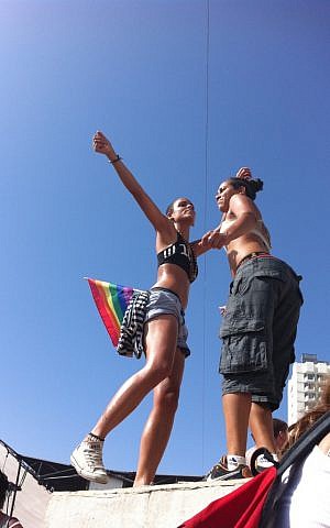 A couple dances at the 2011 gay pride parade after-party at Gordon Beach in Tel Aviv (photo credit: Michal Shmulovich)
