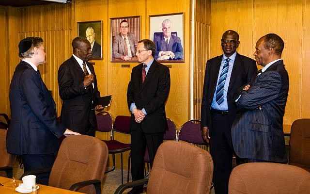 Prof. Eugene Kandel, director of Israel's National Economic Council (center) discusses key issues with (left to right) Africa's Voices in Israel mission leader, Michael Landau, Ghana's Central Bank Governor Prof. Kwesi Bekoe Amissah Arthur, South Sudan's Central Bank Governor Prof. Kornelio Koriom Mayik, and Swaziland's Central Bank Governor Prof. Martin Dlamini. (photo credit: David Katz/Africa's Voices in Israel) Prof. Eugene Kandel, director of Israel's National Economic Council (center) discusses key issues with (left to right) Africa's Voices in Israel mission leader, Michael Landau, Ghana's Central Bank Governor Prof. Kwesi Bekoe Amissah Arthur, South Sudan's Central Bank Governor Prof. Kornelio Koriom Mayik, and Swaziland's Central Bank Governor Prof. Martin Dlamini. (photo credit: David Katz/Africa's Voices in Israel)