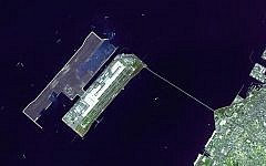 Satellite image of Kansai International Airport in Osaka Bay in Japan (photo credit: courtesy of NASA Earth Observatory)