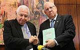 Then-state comptroller Micha Lindenstrauss submits his report on the Carmel forest fire to then-Knesset speaker Reuven Rivlin, June 2012. (Miriam Alster/Flash90)
