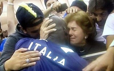 Italy's goal-scorer Mario Balotelli hugs his Jewish foster mother Silvia after Thursday's victory over Germany at Euro 2012. (via Twitter)