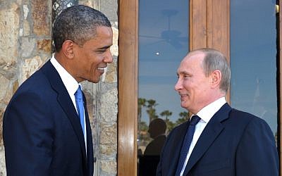 US President Barack Obama greets Russia's President Vladimir Putin at the G-20 Summit in Los Cabos, Mexico, June 2012. (photo credit: AP/Alexei Nikolsky/RIA-Novosti)