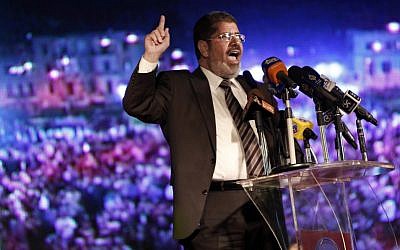 Egyptian President-elect Mohammed Morsi (photo credit: AP Photo/Fredrik Persson)
