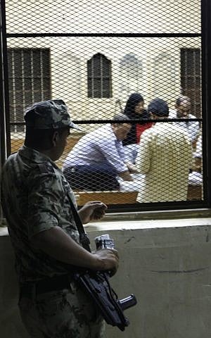 A soldier watches ballot counting in Cairo, June 17 (photo credit: AP Photo/Amr Nabil)