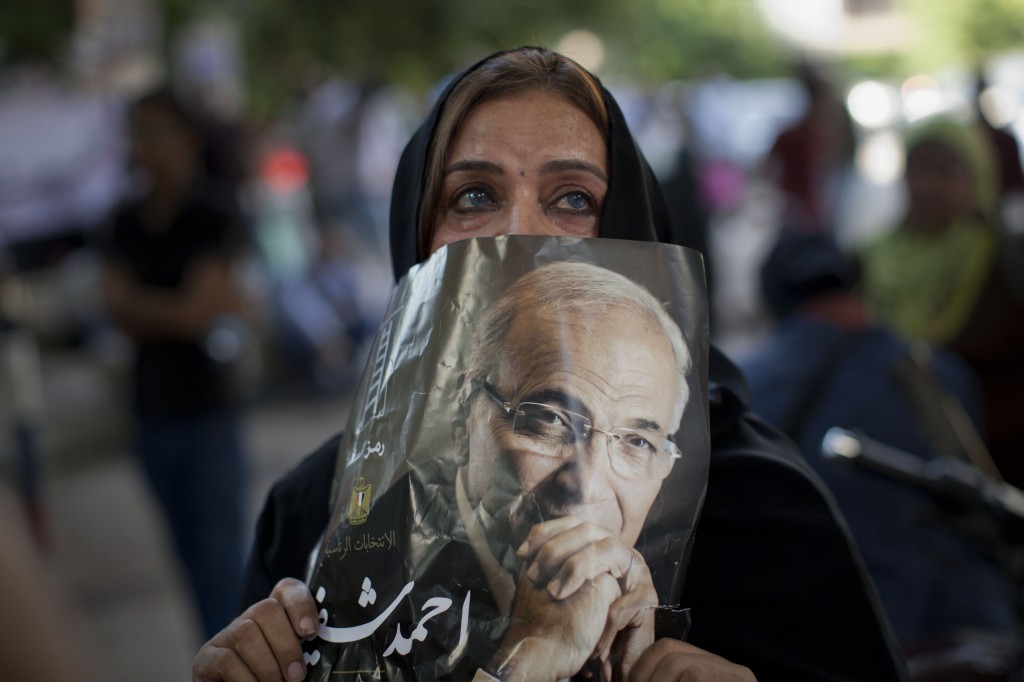 A supporter of former presidential candidate Ahmed Shafiq reacts after hearing the final results of the elections, and his defeat in the presidential race. (photo credit: AP/Bernat Armangue)