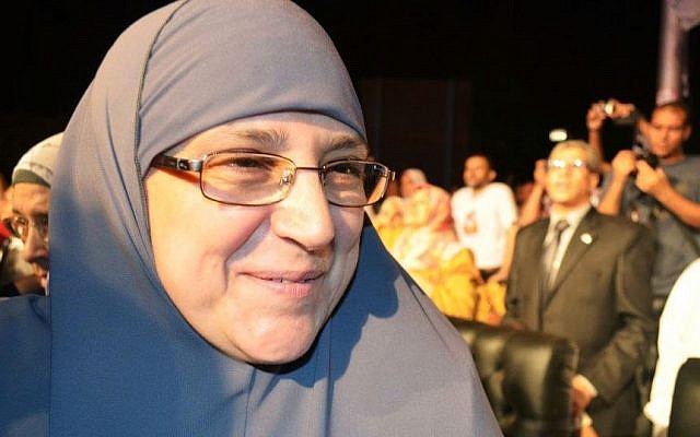 Naglaa Ali Mahmoud attends a campaign rally for her husband, Mohammed Morsi, in Cairo last month. (photo credit: AP/Ahmad Hammad) Naglaa Ali Mahmoud attends a campaign rally for her husband, Mohammed Morsi, in Cairo last month. (photo credit: AP/Ahmad Hammad)