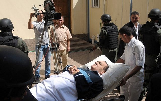 Former Egyptian president Hosni Mubarak is taken to court for a session in his trial in Cairo in September 2011. (photo credit: AP/Mohammed al-Law) Former Egyptian president Hosni Mubarak is taken to court for a session in his trial in Cairo in September 2011. (photo credit: AP/Mohammed al-Law)