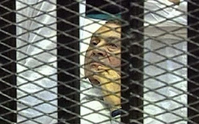 Hosni Mubarak on the first day of his trial in Cairo (photo credit: AP photo) Hosni Mubarak on the first day of his trial in Cairo (photo credit: AP photo)