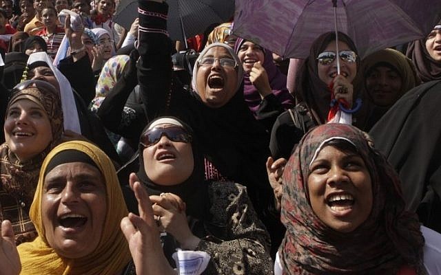 Egyptian women shout slogans at a protest in Tahrir Square, Cairo, Friday.