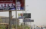 Billboards in Cairo feature presidential candidates Ahmad Shafiq and Muhammad Mursi (photo credit: AP Photo/Amr Nabil)