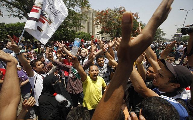 Egyptians protest the court decision in Cairo Thursday (photo credit: AP Photo/Amr Nabil)