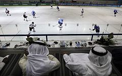 Emirati and Kuwaiti officials watch a hockey match between Oman and Kuwait in Abu Dhabi, United Arab Emirates (photo credit: AP/Kamran Jebreili)