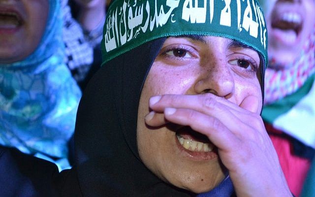 An anti-Syrian regime protester shouts slogans during a demonstration against the Houla massacre, held by the Syrian opposition citizens who live in Lebanon.