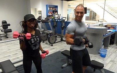 Sky Gym client Alana Shipp and Meny Elbaz in training (photo credit: Dani Bronstein)
