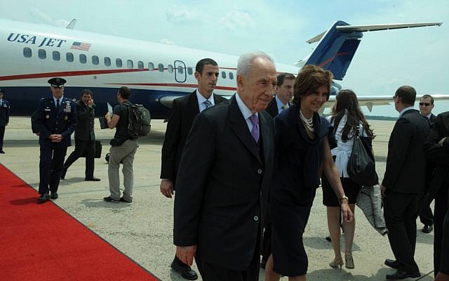 Israeli President Shimon Peres arriving in Washington, DC, where he will be awarded the US Presidential Medal of Freedom (photo credit: Courtesy Amos Ben Gershom/GPO)