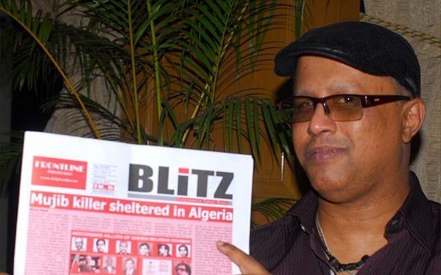 Salah Uddin Shoaib Choudhury holding the English-language Weekly Blitz. (Larry Luxner) Salah Uddin Shoaib Choudhury holding the English-language Weekly Blitz. (Larry Luxner)