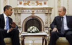Relations were expected to improve between US President Barack Obama (left) and Russian President Vladimir Putin, pictured in 2009, after the revocation of the Jackson-Vanik amendment. (photo credit: AP/Haraz N. Ghanbari)