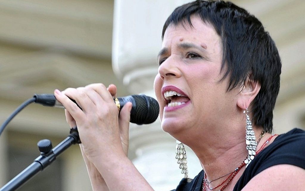 Eve Ensler, author of 'The Vagina Monologues,' speaks on June 18, 2012 during a performance of her play by Democratic state Rep. Lisa Brown, 10 other lawmakers and several actresses on the Michigan Statehouse steps. (photo credit: AP Photo/Detroit News, Dale G. Young)