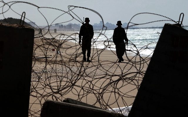 Israeli soldiers along the Gaza border (illustrative photo credit: Tsafrir Abayov/Flash90)