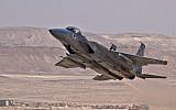 A Double Tail Squadron F-15 takes off during a training mission at the Uvda air base. (photo credit: Ofer Zidon/Flash90)