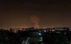 Smoke rises in Gaza after Israeli warplanes strike Hamas targets in June 2012. (photo credit: Majdi Fathi,@RichardDufek, Twitter)
