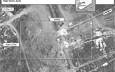 A May 31 photo showing Syrian artillery aiming towards the city of Homs (photo credit: Digital globe/US government)