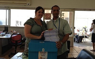 An 'I Vote Israel' staff member handing in 250 absentee ballots to the US embassy (photo credit: courtesy Elie Pieprz) An 'I Vote Israel' staff member handing in 250 absentee ballots to the US embassy (photo credit: courtesy Elie Pieprz)