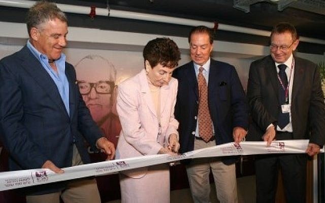 Aviva Ofer, wife of the late Sammy Ofer, flanked by their sons, Eyal (r) and Idan (l), cuts the ribbon at event at Rambam Medical Center in Haifa. (photo credit: Paul Melling-RHCC) Aviva Ofer, wife of the late Sammy Ofer, flanked by their sons, Eyal (r) and Idan (l), cuts the ribbon at event at Rambam Medical Center in Haifa. (photo credit: Paul Melling-RHCC)