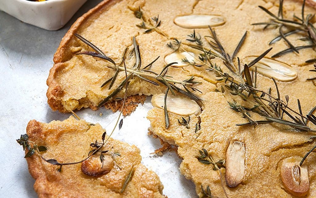 A rosemary and garlic-strewn farinata (photo credit: Antony Michaello, courtesy Korim Publishers)