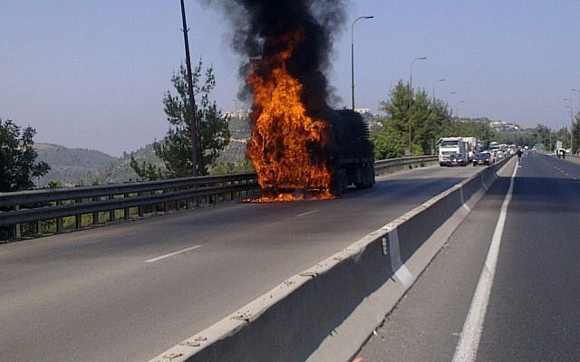Illustrative: A burning truck on the Jerusalem-Tel Aviv highway, Thursday (photo credit:Times of Israel)