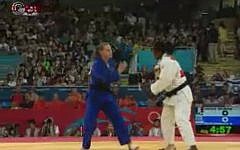 Israeli judoka Alice Schlesinger (blue) was eliminated from Olympic competition on Tuesday (photo credit: screen capture iba.org.il)