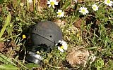 Illustrative - A standard IDF tear gas hand grenade (photo credit: CC-BY-SA Daboos Hassan/Wikipedia)