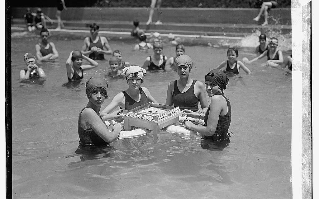 This 1924 photo of a floating game of mah jongg is part of the 'Project Mah Jongg' exhibit now showing at the Skirball Cultural Center in Los Angeles. (photo credit: Courtesy Library of Congress, Prints and Photographs Division/JTA)