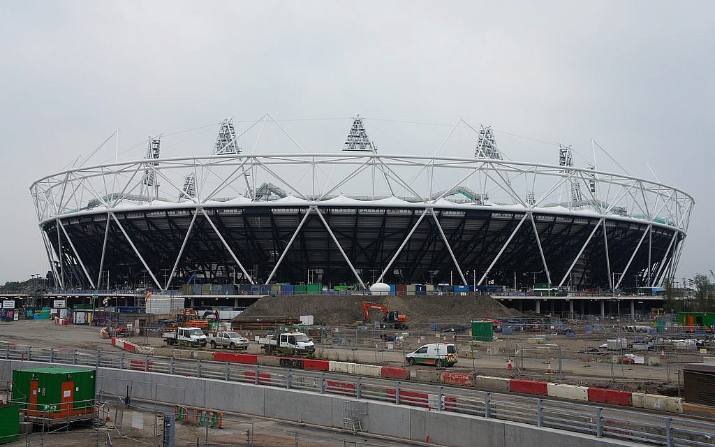 The Olympic Stadium in London. NBC sportscaster Bob Castas will memorialize the athletes murdered in Munich in 1972 when the Israeli team enters the stadium during the opening ceremony on July 27th. (photo credit: CC BY, James Mitchell,Flickr) The Olympic Stadium in London. NBC sportscaster Bob Castas will memorialize the athletes murdered in Munich in 1972 when the Israeli team enters the stadium during the opening ceremony on July 27th. (photo credit: CC BY, James Mitchell,Flickr)