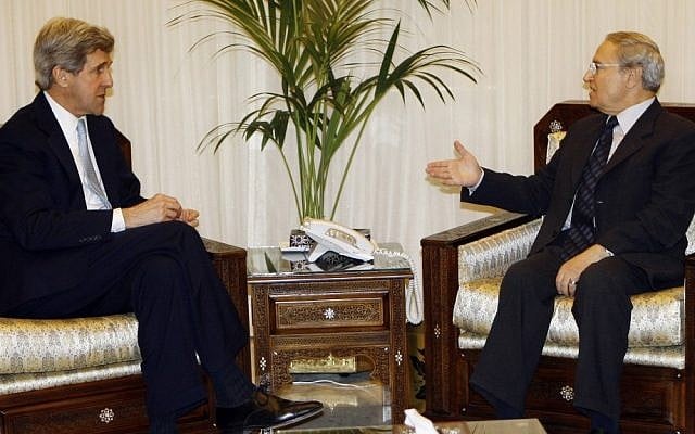 Farouk al-Sharaa, right, meeting with US Senator John Kerry in Damascus in 2009. (photo credit: AP/Bassem Tillawi) Farouk al-Sharaa, right, meeting with US Senator John Kerry in Damascus in 2009. (photo credit: AP/Bassem Tillawi)