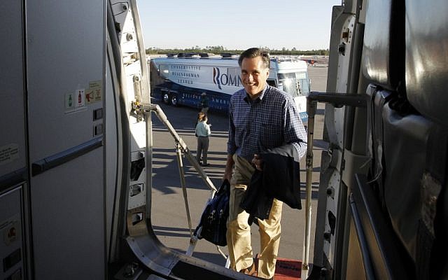 Republican presidential candidate Mitt Romney, leaves his campaign bus and boards his campaign plane in January (photo credit: AP/Charles Dharapak) Republican presidential candidate Mitt Romney, leaves his campaign bus and boards his campaign plane in January (photo credit: AP/Charles Dharapak)