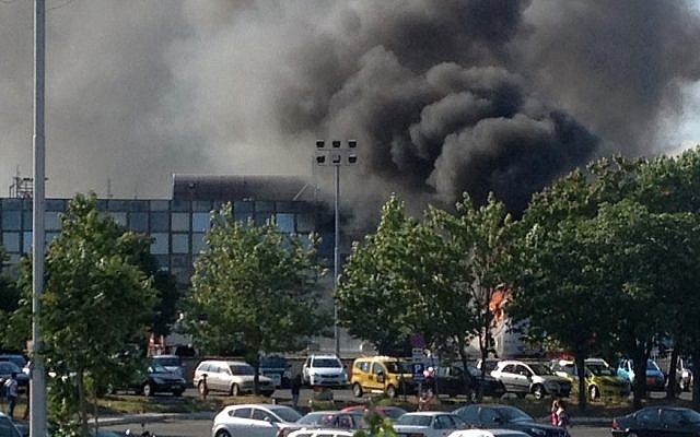 Smoke rises into the sky after an explosion at Burgas airport, Bulgaria, July 18, 2012. (AP Photo/Burgasinfo) Smoke rises into the sky after an explosion at Burgas airport, Bulgaria, July 18, 2012. (AP Photo/Burgasinfo)