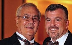 US Rep. Barney Frank, D-Mass., left, and Jim Ready posing at their wedding reception Saturday July 7, 2012. Frank married his longtime partner in a ceremony officiated by Massachusetts Gov. Deval Patrick in Newton, Mass. Saturday. (photo credit: AP Photo/Fotique, Jaime E. Connolly)
