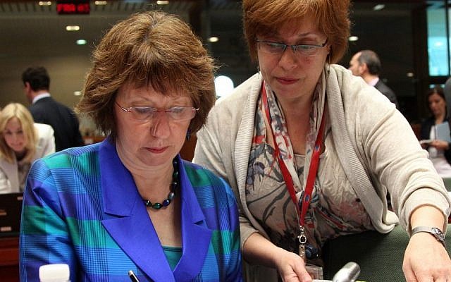 EU foreign policy chief Catherine Ashton, left, signs documents prior to the start of an EU foreign affairs meeting at the European Council building in Brussels on Monday, July 23, 2012 (photo credit: AP/Yves Logghe) EU foreign policy chief Catherine Ashton, left, signs documents prior to the start of an EU foreign affairs meeting at the European Council building in Brussels on Monday, July 23, 2012 (photo credit: AP/Yves Logghe)