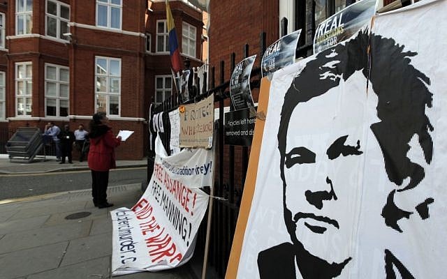 Placards and messages placed by supporters of WikiLeaks founder Julian Assange outside the Ecuador Embassy in London in late June, where Assange attempted to gain political asylum. (photo credit: Lefteris Pitarakis/AP) Placards and messages placed by supporters of WikiLeaks founder Julian Assange outside the Ecuador Embassy in London in late June, where Assange attempted to gain political asylum. (photo credit: Lefteris Pitarakis/AP)
