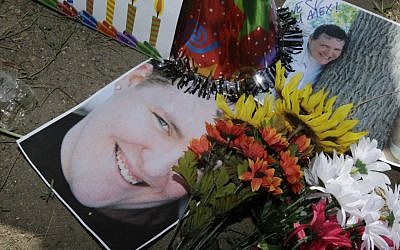 A memorial for Alex Sullivan, killed when a gunman stormed a Colorado movie theater on Friday. (photo credit: AP/Ted S. Warren)