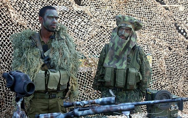 File photo of Kfir Brigade soldiers dressed in camouflage (photo credit: Roni Schutzer/Flash90)