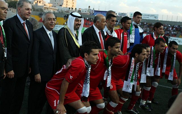 A friendly match between Jordan and Palestine (red) during a visit by the President of the International Olympic Committee (IOC) Jacques Rogge in Ramallah on October 5, 2010. (photo credit: Issam Rimawi/Flash 90) A friendly match between Jordan and Palestine (red) during a visit by the President of the International Olympic Committee (IOC) Jacques Rogge in Ramallah on October 5, 2010. (photo credit: Issam Rimawi/Flash 90)