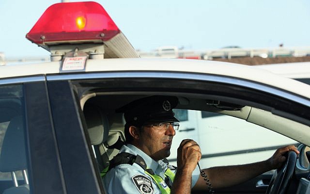 Illustrative photo: Traffic policeman at work. (Moshe Shai/Flash90)