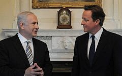 British Prime Minister David Cameron, right, meets with Prime Minister Benjamin Netanyahu in London in May, 2011 (Photo credit: Amos Ben Gershom/ GPO/Flash90)